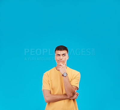 Buy stock photo Thinking, mockup and young man in studio with decision, brainstorming or solution expression. Problem solving, idea and male model from Canada with reflection, memory or question by blue background.