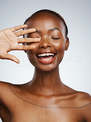 Buy stock photo Hand of black woman, smile or natural beauty aesthetic for wellness in studio with pride, shine or glow. Dermatology, clean face or happy African girl model with skincare results on white background