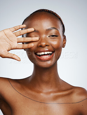 Buy stock photo Portrait of happy black woman, hand or natural beauty for wellness in studio with shine or glow. Dermatology, clean face or proud African girl model with smile or skincare results on white background