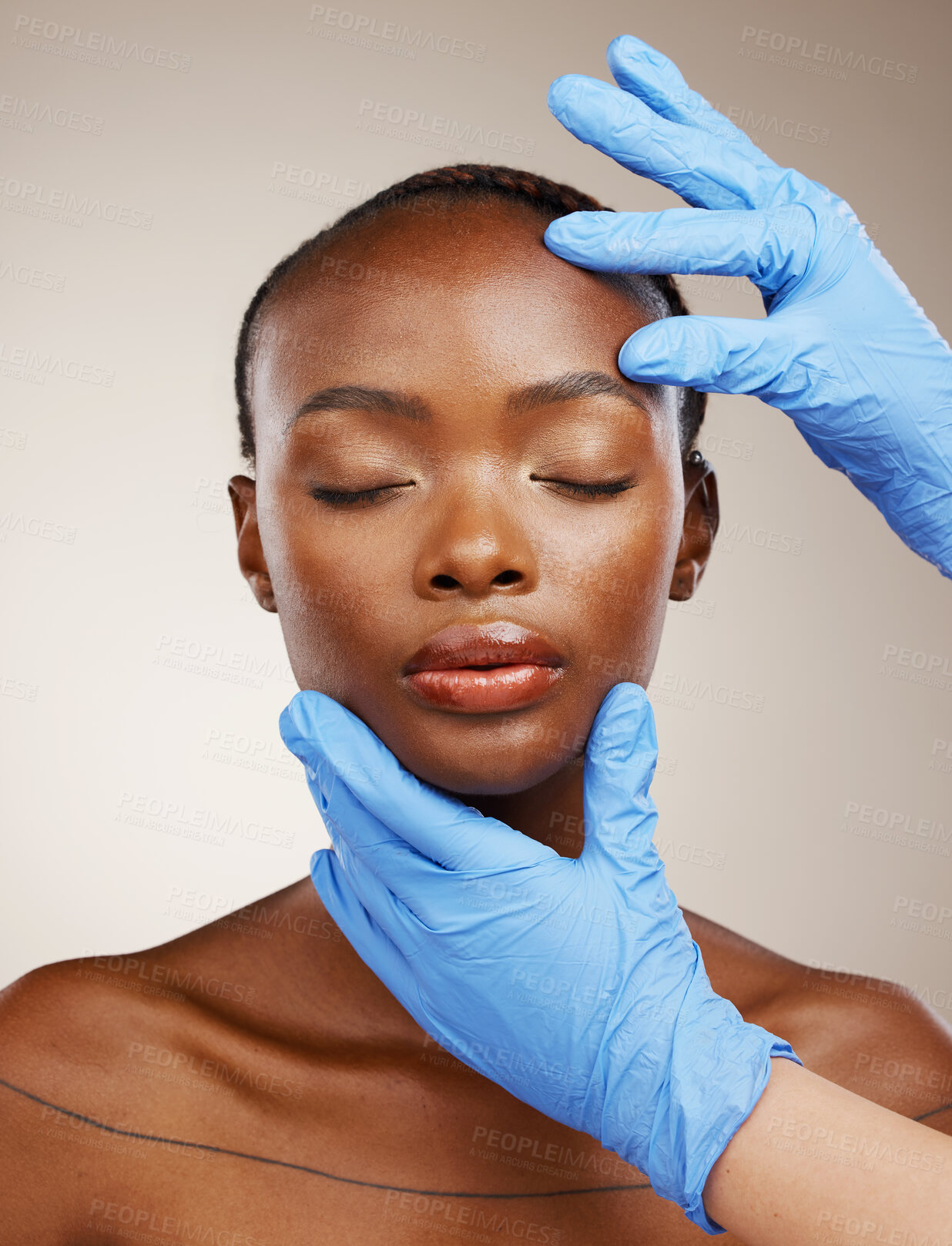 Buy stock photo Portrait, gloves and plastic surgery on face of a black woman in studio on a gray background for cosmetic change. Patient, skincare transformation and a young model getting ready for facial treatment