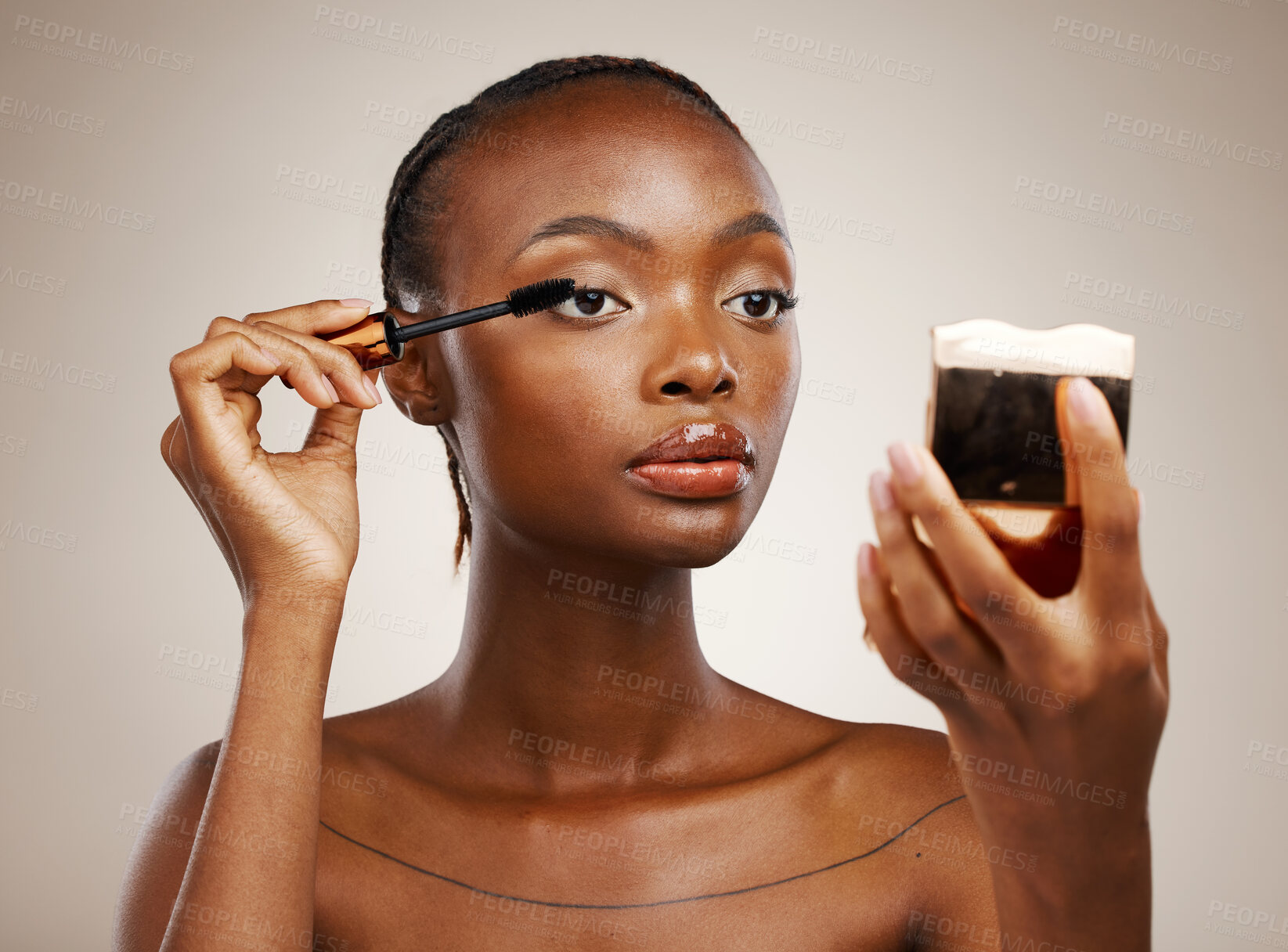 Buy stock photo Black woman, mascara with brush and mirror for beauty, makeup and shine isolated on brown background. Eyelash extension, wand and skin glow with cosmetology, transformation and wellness in studio