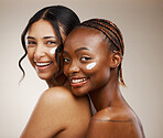 Women, cream on face and beauty with diversity, friends and inclusive skincare on studio background. Dermatology, natural cosmetics and happiness in portrait, wellness and skin glow with moisturizer