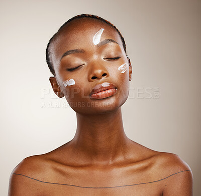 Buy stock photo Beauty, self care or black woman with skincare, cream or dermatology on grey studio background. African person, girl or model with creme, aesthetic or cosmetics with luxury grooming and spa treatment