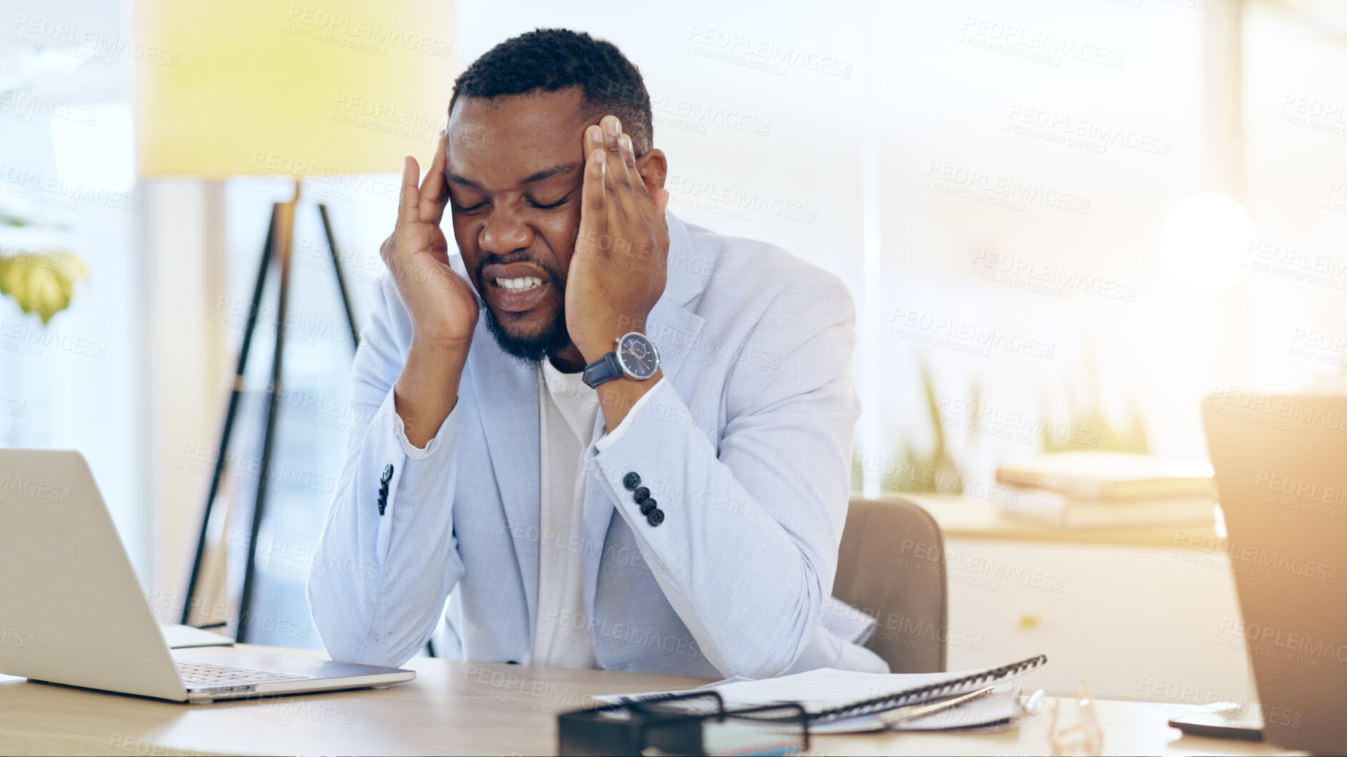 Buy stock photo Business man, headache and stress on laptop for stock market crash, financial mistake or error in office. Frustrated worker or african trader with depression, pain or tired for trading or job crisis