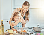 Mom, girl child and flour in kitchen, development and skills with bonding, love and care in family house. Cooking, mother and daughter with smile, teaching and eggs on table, dust and help for food