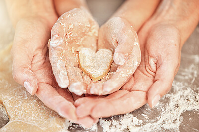 Buy stock photo Hands, baking and heart with mother, kid and bonding together as daughter, learning or helping. Family, love and child development with quality time, baker and dough with skills, support and teaching