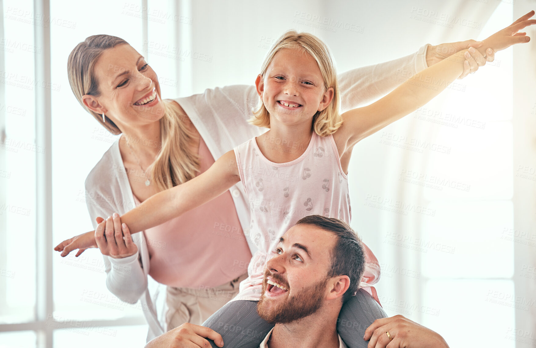 Buy stock photo Parents, child and airplane on couch, smile or portrait for love, care or bonding in living room at family home. Father, mother and daughter for plane game, excited and relax on lounge sofa in house