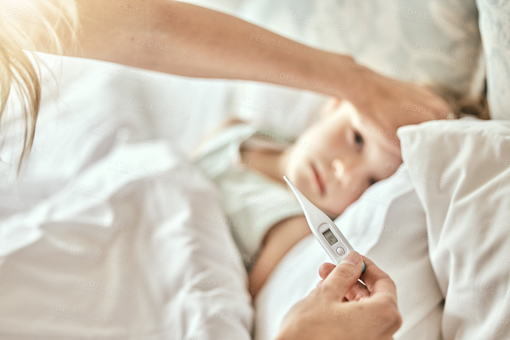 Buy stock photo Parent, hands and thermometer with sick child in bed for fever, cold or flu virus at home. Closeup of mother checking child with illness for temperature or measurement in bedroom or rest at house