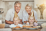 Portrait of grandparents, children and birthday cake for celebration with candles, love and sweets in home. Happiness, face of old man and woman together at table at girl kids party event in house.