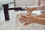 Bathroom, water and children cleaning hands with soap, foam or learning healthy hygiene together. Washing dirt, germs or bacteria on fingers, kids in home in morning for wellness, safety or skin care