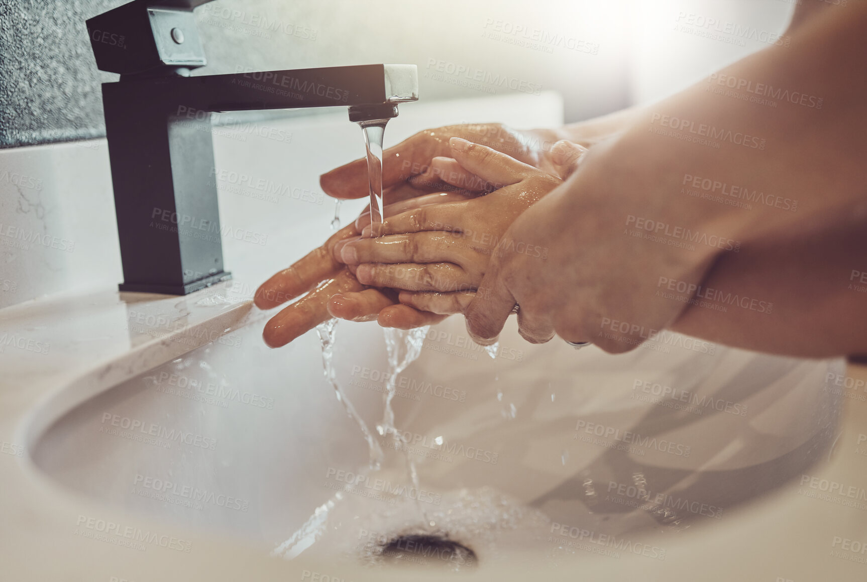 Buy stock photo Bathroom, water and parent with child washing hands with soap, foam or learning healthy hygiene together. Washing dirt, germs or bacteria, person and kid in home in morning with help, care or support