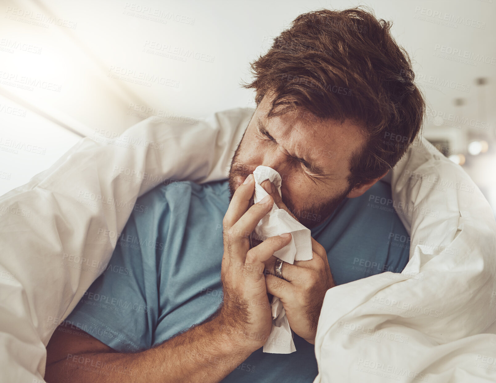Buy stock photo Man, blowing nose and sneezing, sick with allergies or influenza, virus and bacteria with health fail at home. Toilet paper, illness and healthcare with crisis or blanket, medical condition and flu
