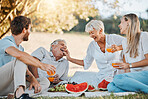 Picnic, laughing family and senior parents, daughter and son having fun, eating grapes and enjoy outdoor nature, park or bond. Watermelon fruits, comedy and relax elderly mom, dad or people together