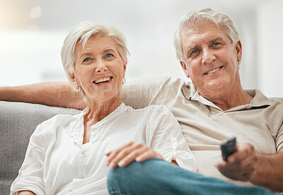 Buy stock photo Happy senior couple, watching TV and relax on sofa for living room entertainment or streaming at home. Mature man and woman smile for series, shows or channels with remote on lounge couch in house