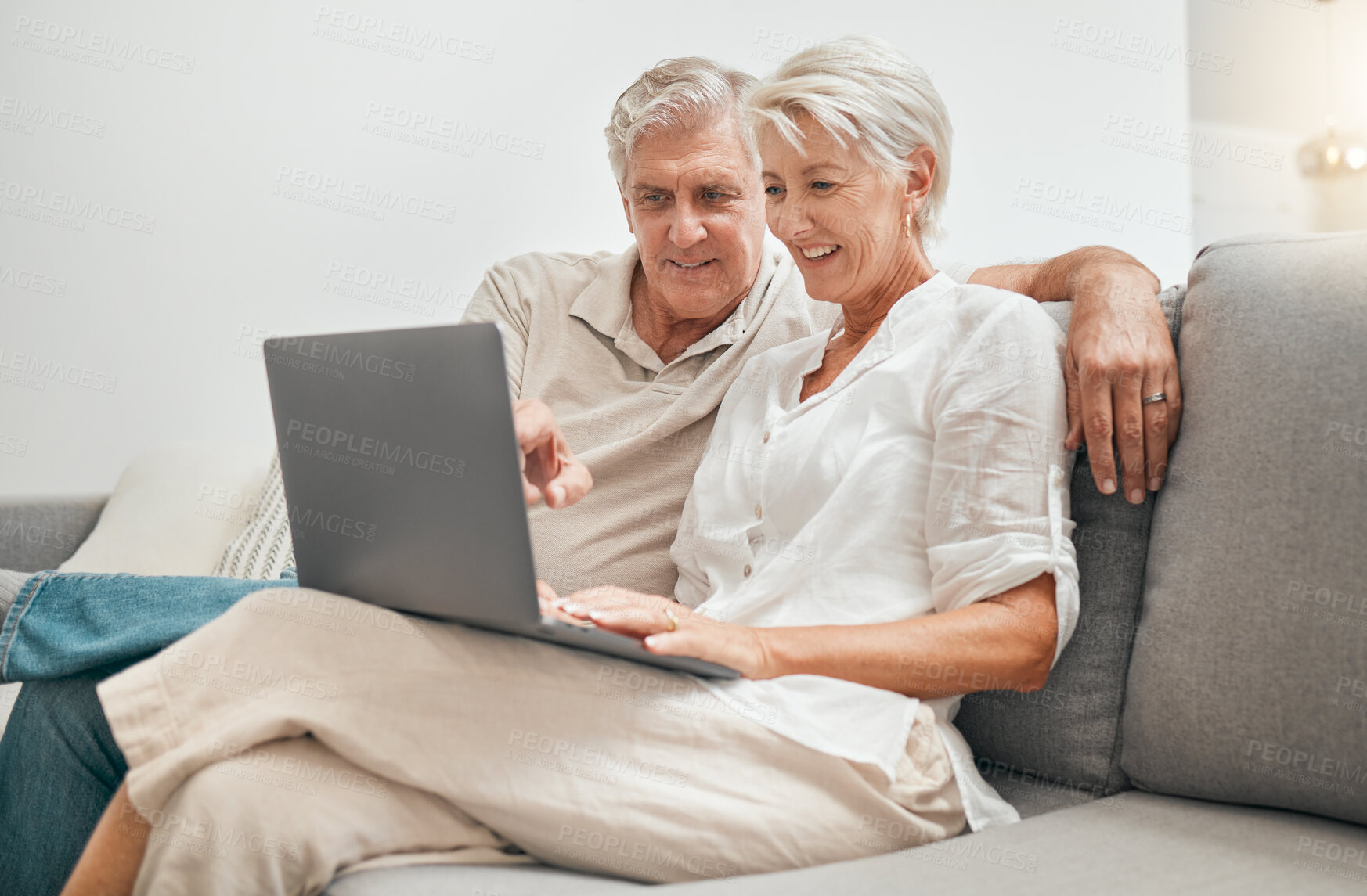 Buy stock photo Senior, couple and online shopping with laptop on sofa in home living room with ecommerce, promotion or online deal. Old people, search and shop on internet with computer in lounge together