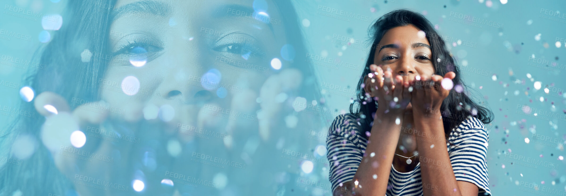 Buy stock photo Blowing glitter, woman and portrait with double exposure and sparkle in a studio with celebration. Blue background, female person and confetti with modern fashion, surprise and silver decoration