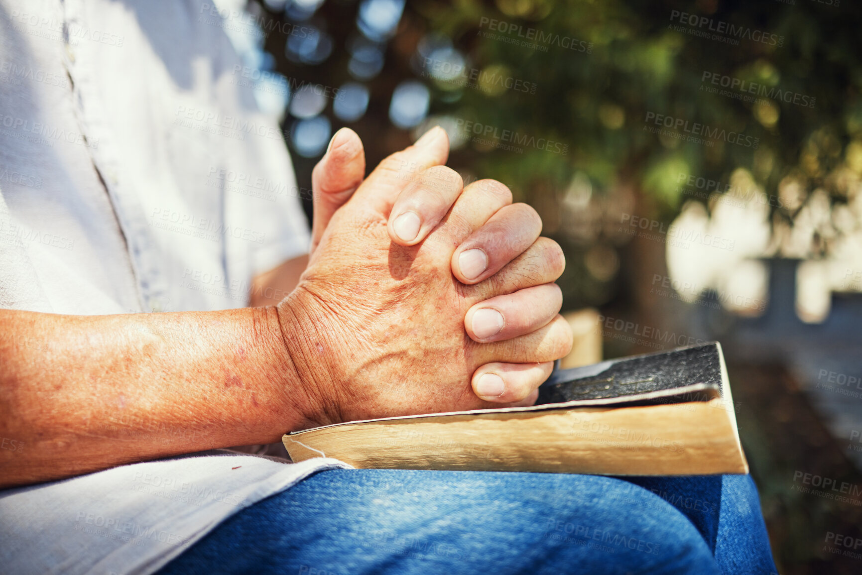 Buy stock photo Outdoor, hands and person with a bible, spiritual and believe with prayer, guidance or religion with hope. Christian, closeup or human with scripture, outside or calm with peace, holy book or worship