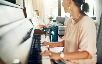 Buy stock photo Senior woman playing piano for music in living room for bonding, entertainment or having fun. Happy, smile and elderly Asian female person with husband in retirement enjoying keyboard at modern home.