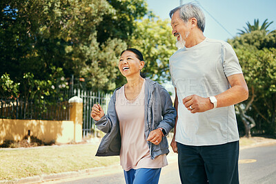 Buy stock photo Running, mature couple and happy for fitness, exercise and workout in road of neighborhood. Asian man, woman and smile in street for healthy cardio wellness, performance and action together outdoor 