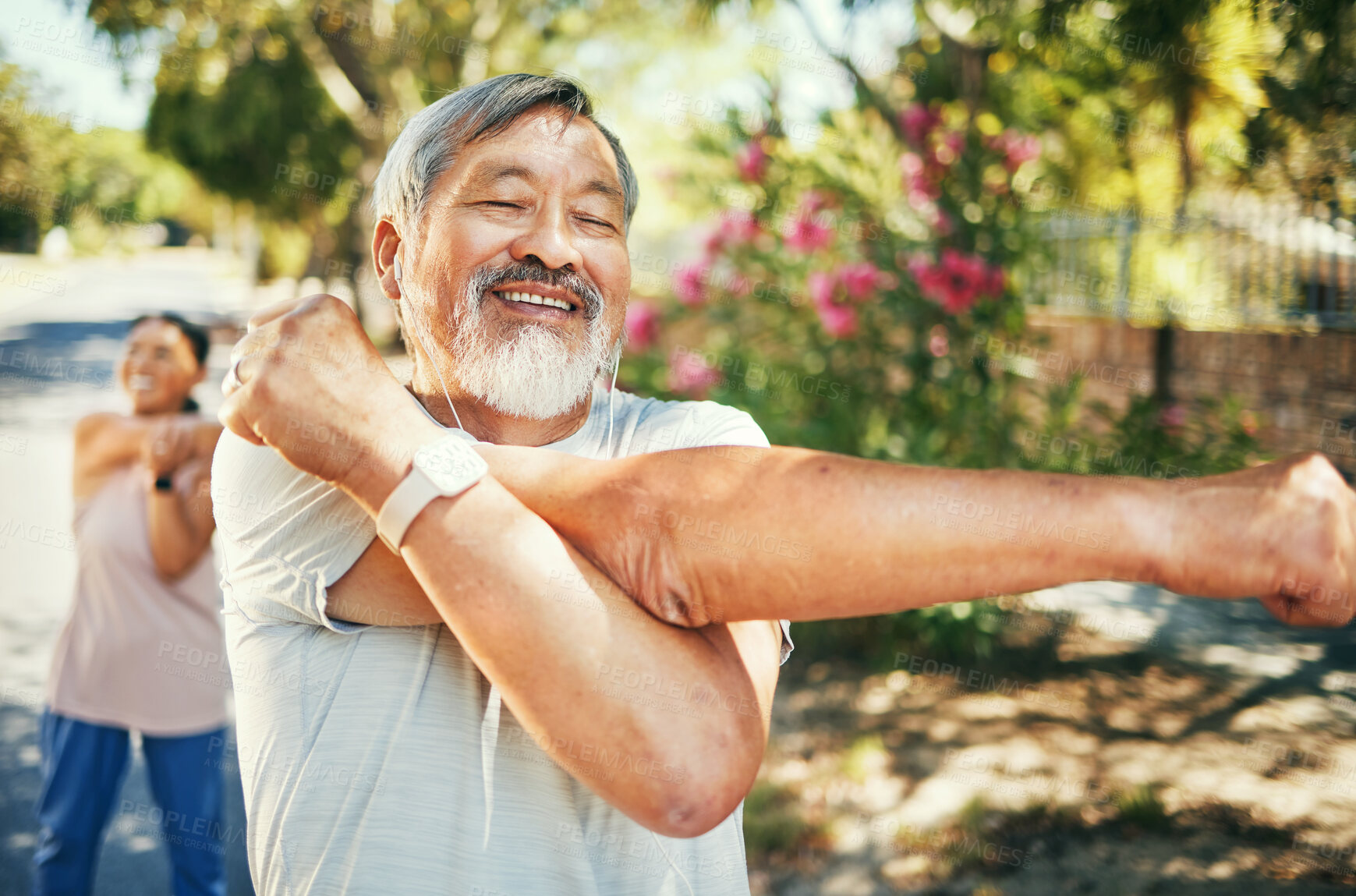 Buy stock photo Man, happy and stretching arms for run outside, earphones and listening to music, audio and song for motivation. Healthy friends, cardio and training in retirement, workout and exercise in warm up