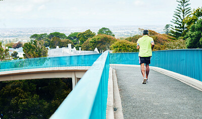 Buy stock photo Back view, running or man on bridge on fitness journey or adventure for freedom, training or workout. Travel, holiday vacation or person on outdoor activity for cardio exercise or wellness in Peru