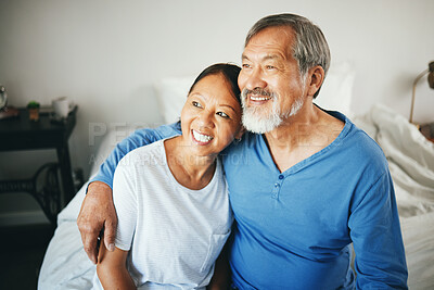 Buy stock photo Senior, thinking or happy couple hug in house bedroom together to relax on holiday with bond or support. Embrace, lovers or romantic Asian man with a mature woman with love, smile or care in marriage