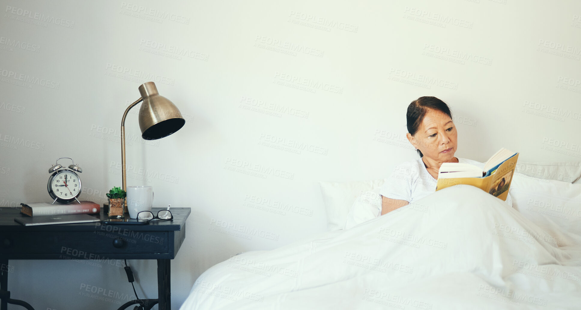 Buy stock photo Bedroom, relax and senior woman reading a book, education and literature with peace, calm and resting. Bed, home and mature lady with fantasy, novel and thinking with elderly person and pensioner