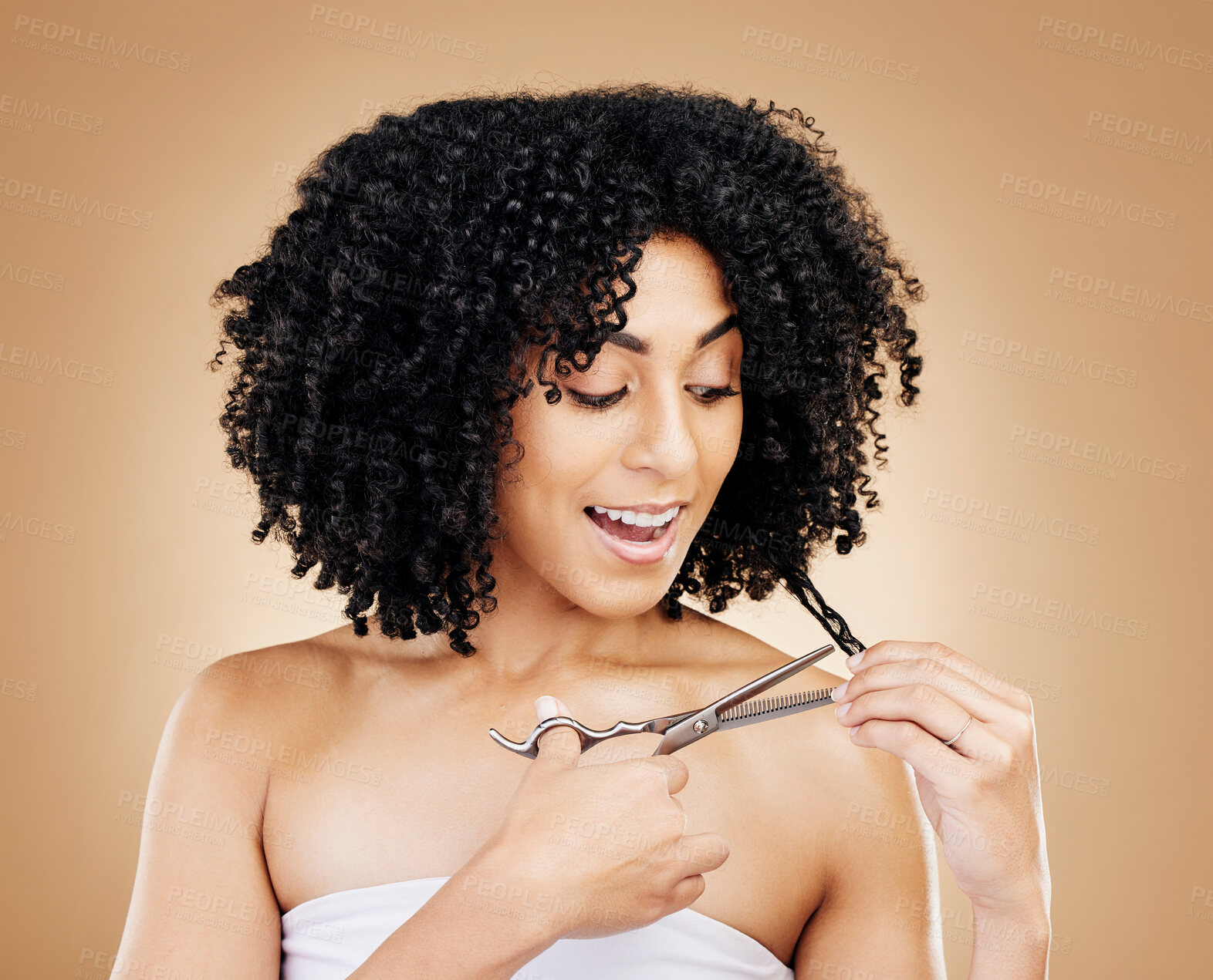 Buy stock photo Woman, hair and cut for change, transformation and style with happiness, smile or brown studio background. Scissors, self care or freedom from loss, beauty and hairdresser for curls, positive or face