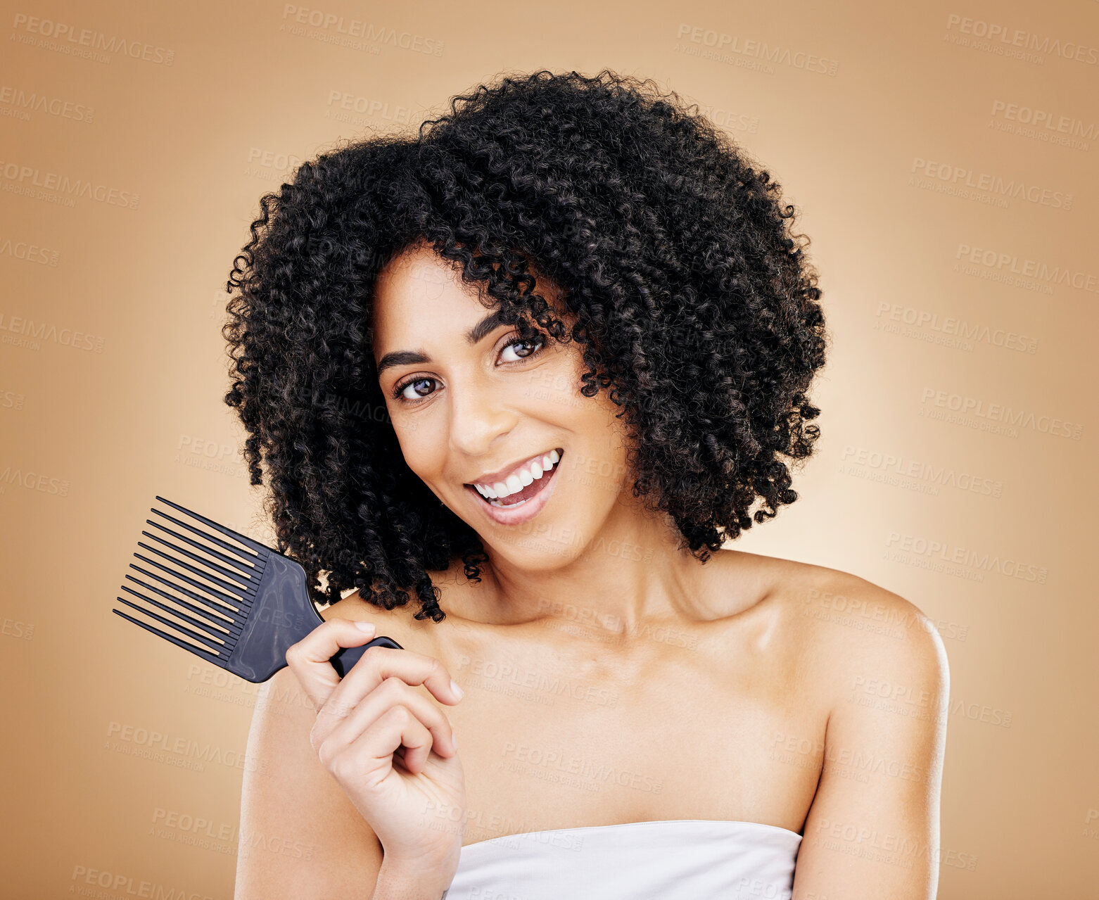 Buy stock photo Hair, curls and woman with comb, beauty and treatment for shine, cosmetic care and portrait on studio background. Wellness, haircare and growth with strong texture and brush locks, volume and afro