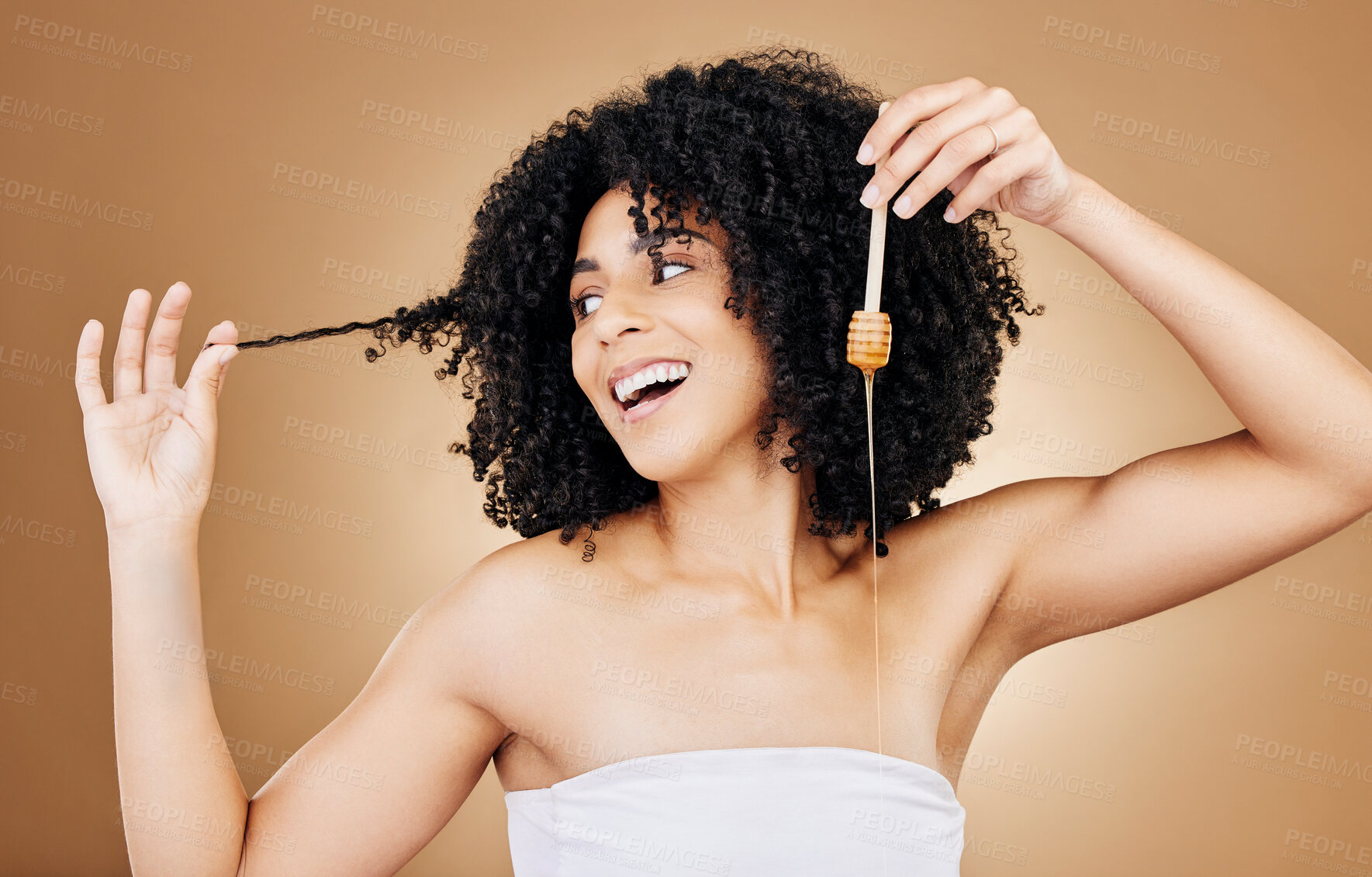 Buy stock photo Honey, hair and beauty portrait of woman with natural, care and oil treatment on studio background with happiness. Happy, African haircare and product with honeycomb moisture and sugar benefits