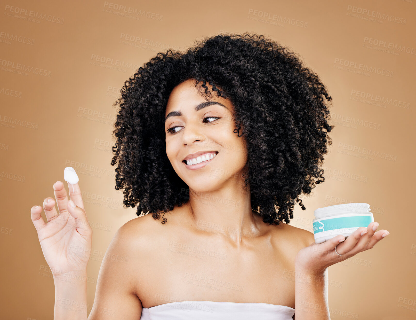 Buy stock photo Studio beauty, face and happy woman with cream treatment, sunscreen container and facial glow, shine or cosmetology. Cosmetics girl, self care creme and collagen hydration product on brown background