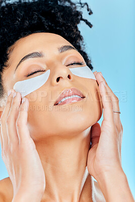 Buy stock photo Relax, woman face and under eye patch for skincare hydration glow, beauty self care or feel moisturizing product results. Spa salon wellness, studio cosmetics and facial mask model on blue background