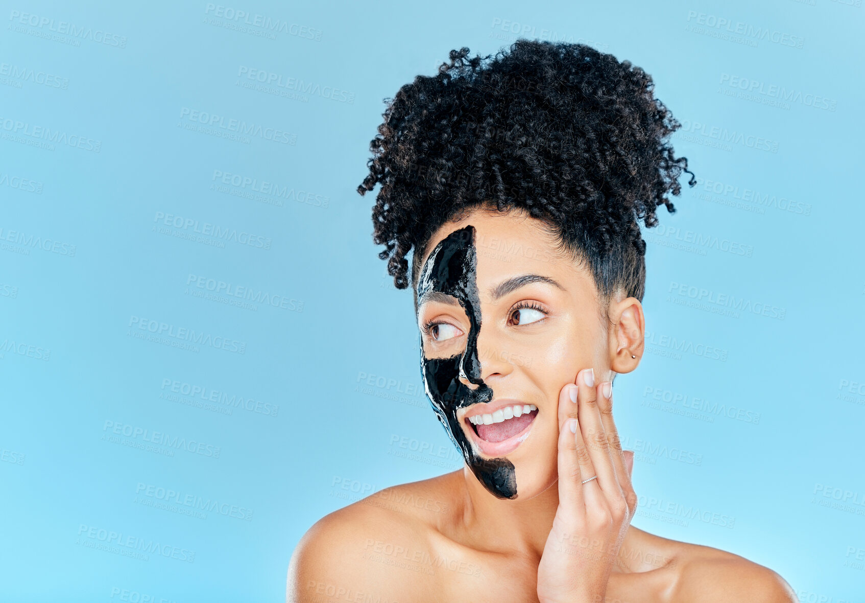 Buy stock photo Mockup, charcoal mask and face of happy woman for facial treatment, anti aging and wellness in studio. Beauty, salon and person for healthy skin, cosmetics and grooming on blue background space