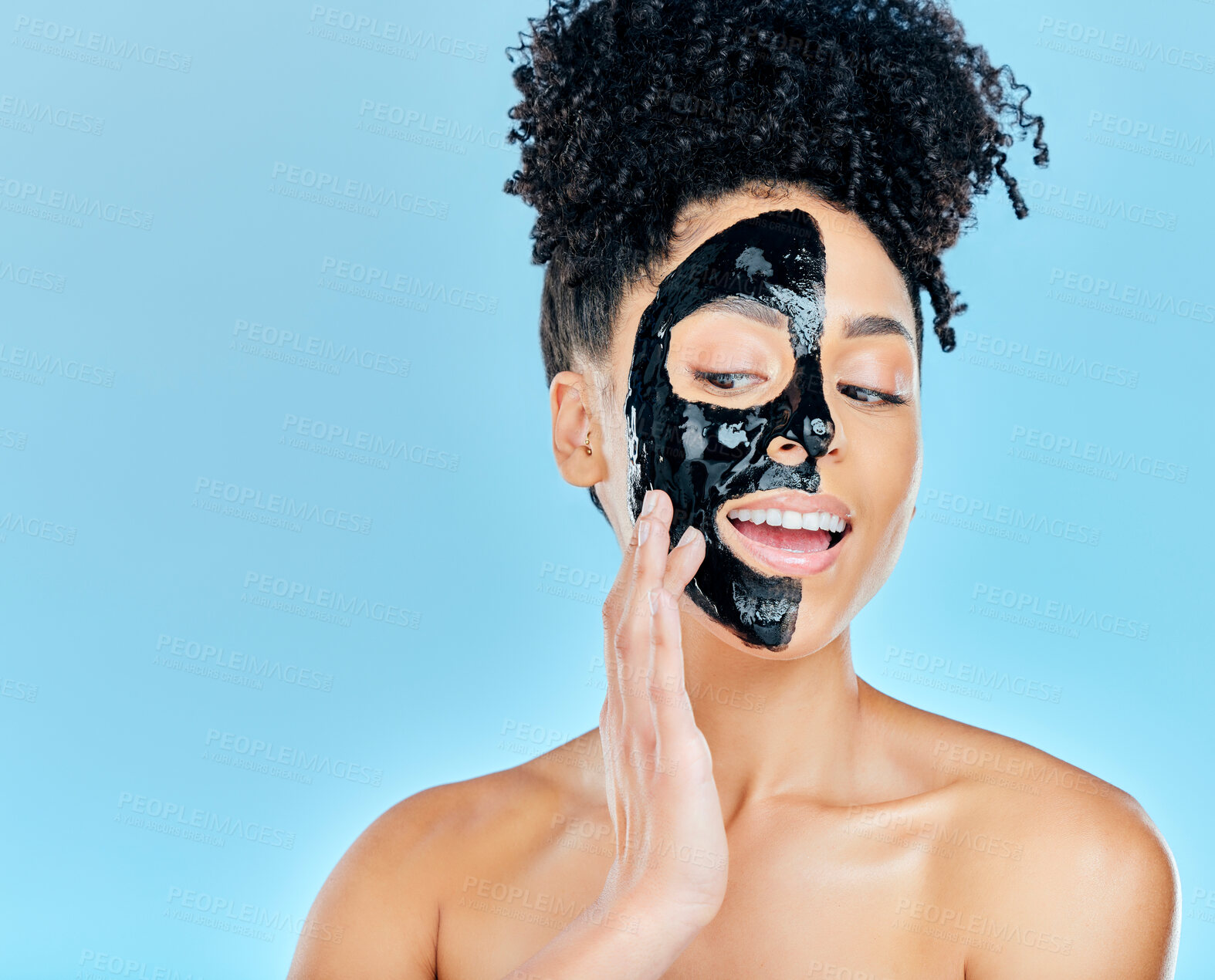 Buy stock photo Skincare, face mask and woman in studio for charcoal facial treatment, anti aging and wellness. Beauty salon, dermatology and face of person for health, cosmetics or grooming on blue background