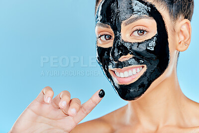 Buy stock photo Beauty, charcoal face mask and portrait of woman for facial treatment, anti aging detox and wellness. Skincare, studio and person with products for health, cosmetics or grooming on blue background