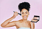 Makeup brush, foundation and studio portrait of happy woman with tools, beauty product or cosmetics palette choice. Skincare shine, face powder application and aesthetic person on pink background