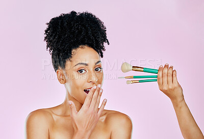 Buy stock photo Surprise makeup brush, studio portrait and woman with tools for skincare shine, foundation application or wow anti aging treatment. Face cosmetics, cosmetology and shocked person on pink background