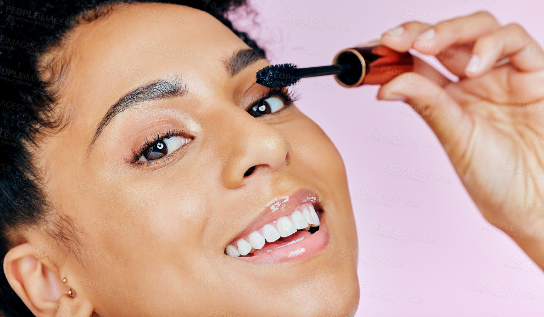 Buy stock photo Closeup, happy woman and mascara for makeup in studio with lashes or cosmetics on pink background. African, female model and smile in portrait for beauty, treatment and confidence with application