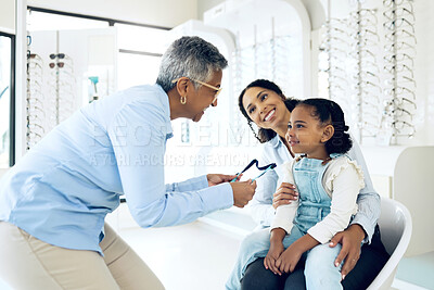 Buy stock photo Optometrist, kid and glasses for eye care, vision or consultation in medical office for lens. Woman, girl and family for support, trust and wellness for appointment, optometry or treatment for health