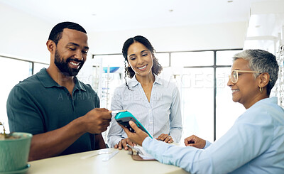 Buy stock photo Couple, card machine and payment, optometry and glasses store with retail, client and cashier, finance and eye care. Health, retail and commerce, financial and people at clinic for vision and eyewear