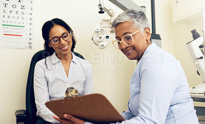 Buy stock photo Optometrist, patient and eye exam, clipboard and health insurance paperwork, help and medical with eyecare. Wellness, contract or agreement with vision, assessment and women in clinic for optometry