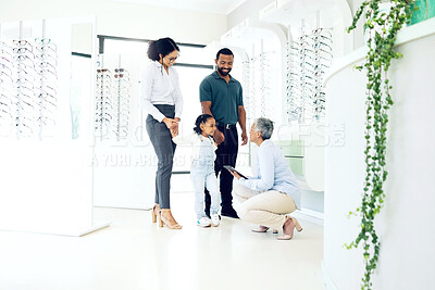 Buy stock photo Optometrist, parents or child for eye care, optometry or vision assessment or test in clinic or store. Man, senior woman or girl kid at optician for eyesight appointment for focus or glasses with joy