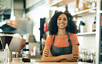 Happy woman, cafe and portrait of small business owner with arms crossed in confidence at coffee shop. Female person, barista or waitress smile for leadership, management or retail service in store