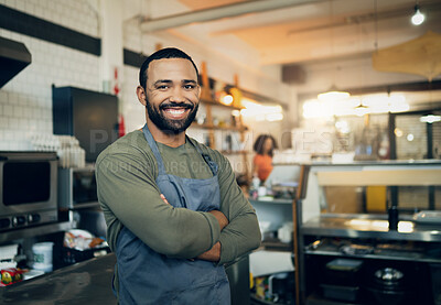 Buy stock photo Happy man, portrait and small business owner in kitchen at restaurant for hospitality service, cooking or food. Face of male person, employee or waiter smile in confidence for professional culinary