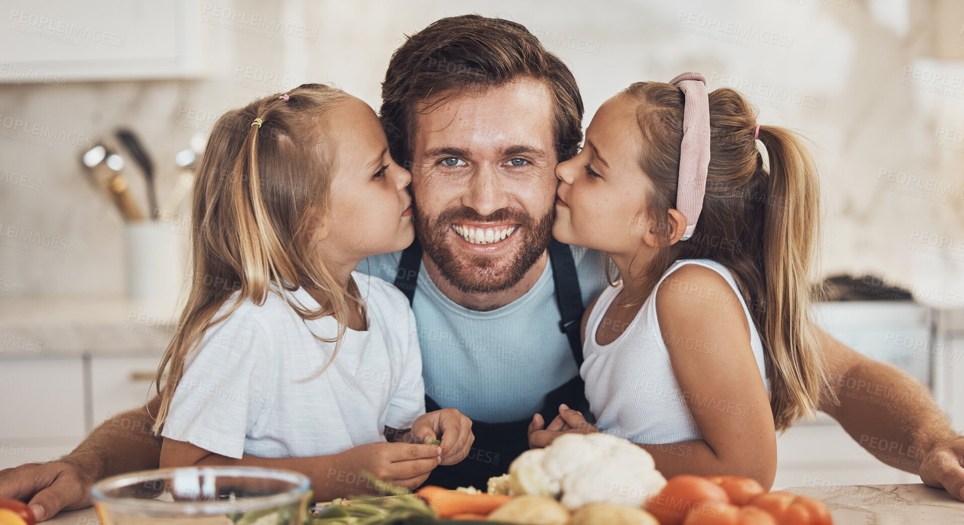 Buy stock photo Portrait, family and kiss on the cheek from children with their father in the kitchen of a home for cooking together. Face, smile and girl kids with their happy parent in the house to make a meal