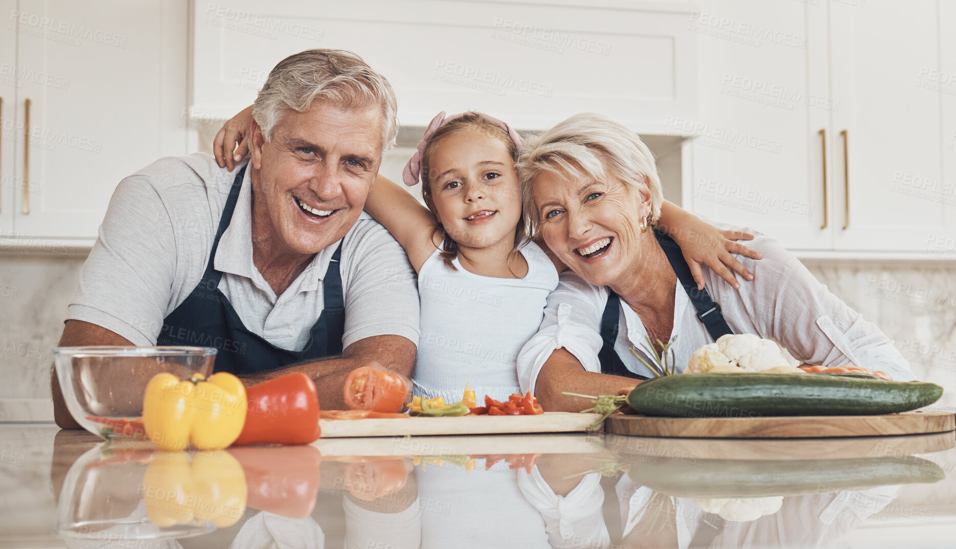 Buy stock photo Family, portrait and girl cooking with grandparents in a kitchen with love, hug or support at home. Food, face and child learning nutrition, health or preparing meal while embracing happy old people 