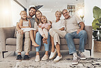 Big family, happy and portrait in home living room, support and bonding together. Parents, grandparents and kids smile on sofa for connection, love children and care in healthy relationship in house