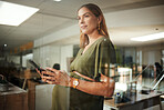 Woman, thinking and smartphone with smile in office for business, networking or ideas for marketing or pregnant. Person, phone and happiness at work for communication, conversation or internet chat