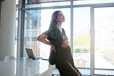 Buy stock photo Pregnant, woman or back pain in office with stress, burnout and relax with eyes closed at desk or table. Person, pregnancy or hand on stomach for risk, anxiety or tired at professional company or job