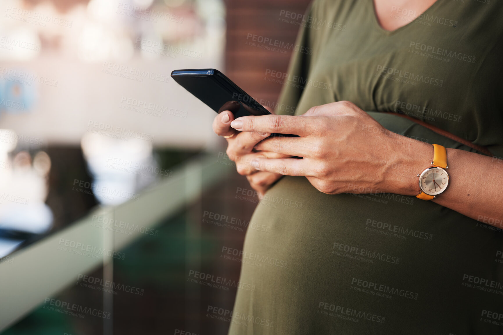 Buy stock photo Hands, phone and pregnant woman typing in home, reading email notification and social media. Pregnancy, smartphone and closeup of mother on internet search for baby news, scroll website or mobile app